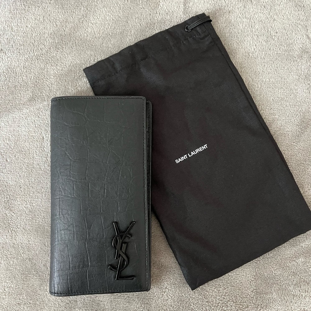 YSL continental wallet in croc embossed leather.